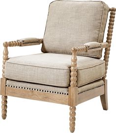 a wooden chair with beige upholstered fabric and beaded trim around the armrests