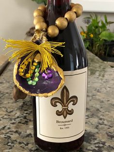 a bottle of wine sitting on top of a counter