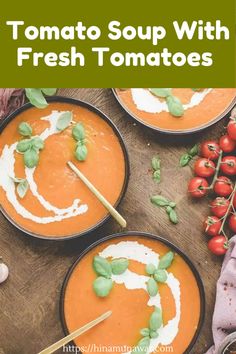 tomato soup with fresh tomatoes in black bowls on a wooden table and text overlay that reads tomato soup with fresh tomatoes