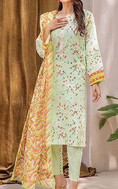 Light Green Cambric Suit -  Pakistani Winter Dresses Green Cotton Dress For Eid, Green Cotton Dress With Dupatta, Fitted Pista Green Cotton Dress, Spring Cambric Dress With Printed Motifs, Cotton Dresses With Digital Print For Spring, Spring Green Cambric Dress, Fitted Green Lawn Suit With Printed Motifs, Pista Green Long Sleeve Lawn Suit For Spring, Green Cambric Dresses With Printed Motifs