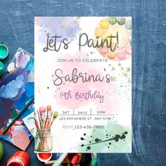 an artistic birthday party with paint and brushes on the table next to it is a sign that says, let's paint join us to celebrate sabrana's 10th birthday