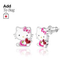 hello kitty earring with pink heart and bow on the side, sitting next to each other