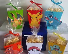 pokemon themed popcorn boxes are on display