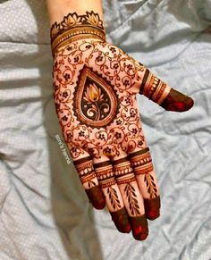 a henna on someone's hand is shown