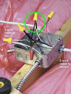 an electrical device is connected to wires and plugs