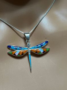 *Multicolored inlay dragonfly jewelry  *Sterling Silver  *Free Shipping  *Handcrafted  *Jewelry ship in Gift box  All components are solid .925 silver.  Thank You For Your Looking ,And Check Out More Items In My Etsy Shop For More Great Deals, Also We Add More Jewelry To Etsy Shop regularly  www.etsy.com/shop/Silverlizzard    PLEASE check their dimensions, before setting the order.  NOTE -Once the parcel gets shipped out, it is usually needed 3-6 business days for every where in US Please keep in mind that once your package is shipped, the amount of time it takes to get to its destination is completely out of my control. Thank you Liz Dragonfly Jewelry, Dragonfly Necklace, Dragonfly Pendant, Blue Opal, Quality Jewelry, Favorite Things List, Handcrafted Jewelry, Jewelry Shop, Jewelry Sets