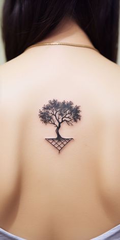 A small and minimalistic tattoo of a tree, symbolizing the quiet elegance and beauty of nature. Small Tree Tattoo, Olive Tattoo, Pure Form, Tree Tattoo