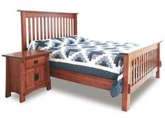 a wooden bed frame with two night stands and a night stand next to it on a white background