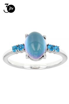 9x7mm Oval Aurora Moonstone With .13ctw Round  Neon Apatite Rhodium Over Sterling Silver Ring. Measures approximately .61"L x .36"W. Not sizeable. Blue Aurora, Sterling Silver Ring, Moonstone, Silver Ring, Aurora, Sterling Silver Rings, Silver Rings, Neon, Sterling Silver