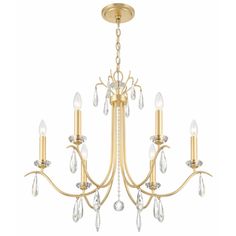 a gold chandelier with crystal drops