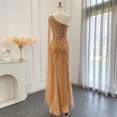 a dress on display in front of a window