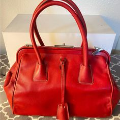 Beautiful Lipstick Red Prada Doctor Style Leather Bag. Size 11” Across And 9” Tall Handle Drop 4.25” Originally Purchased At Prada Chicago In 2000. One Flip Closure At Top Is Missing. Please See Photos. Red Satchel With Handle Drop For Office, Red Shoulder Bag With Silver-tone Hardware And Double Handle, Red Rectangular Satchel With Silver-tone Hardware, Red Satchel Bag With Silver-tone Hardware, Red Bag With Silver-tone Hardware For Daily Use, Daily Red Bag With Silver-tone Hardware, Red Satchel With Silver-tone Hardware For Daily Use, Designer Red Bags With Silver-tone Hardware, Red Leather Satchel With Silver-tone Hardware