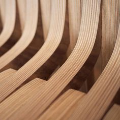 closeup of curved wooden boards on a bench