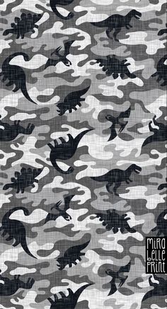 a camouflage pattern with black birds flying through the air