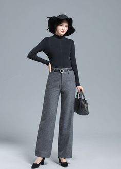 "DETAILS: * 30% wool, 70% polyester fiber * Polyester Lining * Two side pockets * Front hidden zipper closure+buttons * Straight leg pants * High waisted pants * Wide leg pants * Perfect for Winter, autumn * Dry clean *The model is 170cm (5' 7\") tall with 85 cm(33.4\") bust and 67 cm(26.7\")waist. She is wearing the dark gray wool pants in size XS. CUSTOM MADE SERVICE If you * Change other color * Can't find your size in our size Chart * Change the Style * Change the length * Your Height is not Wool Pants For Fall With Straight Leg, Wool Pants For Business Casual In Fall, Tailored Solid Winter Bottoms, Tailored Solid Color Winter Bottoms, Wool Bottoms For Business Casual In Fall, Fall Business Casual Wool Bottoms, Tailored Wool High Waist Wide Leg Pants, Tailored Solid Winter Pants, Tailored Wool Wide Leg Pants With High Waist