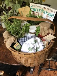 a basket filled with herbs and other items