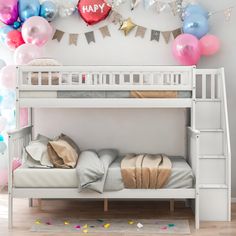 a white bunk bed sitting in front of a wall with balloons and streamers on it