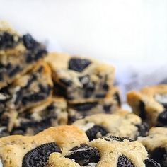 cookies and oreo cookie bars stacked on top of each other