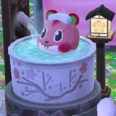 an animal crossing birthday cake is shown in this image