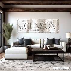 a living room filled with furniture and a large sign on the wall above it that says, johnson