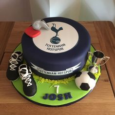 there is a cake with soccer shoes on it