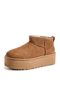 PRICES MAY VARY. Suede upper 17mm UGGplush wool lining 17mm UGGplush wool insole SugarSole EVA outsole 2" platform height Cute Uggs, Ugg Store, Preppy Shoes, Ugg Classic Ultra Mini, Preppy Fall, Shoe Wishlist, Shoe Inspo, Trendy Fall Outfits, Fall Fits