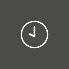 the clock icon is white on a dark background