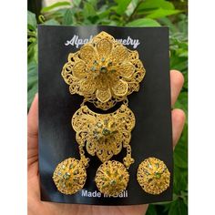 Brooch | brooches Accessories | Indonesian accessories | Bali indonesia | A Set Of Balinese Alpaca Brooch | Jewelry Brooch A set of brooches consists of: Ring Earrings chest brooch Traditional Ceremonial Brooch Jewelry, Traditional Wedding Brooch Jewelry, Gold Brooches With Intricate Design For Wedding, Traditional Green Brooch Jewelry, Gold Jewelry Brooch For Celebration, Ornate Green Brooches For Wedding, Traditional Gold Filigree Brooches, Traditional Gold Brooches For Gifts, Traditional Brooches With Intricate Design For Gifts