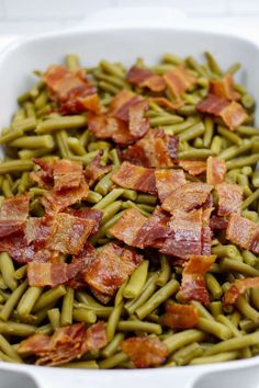 green beans with bacon in a white dish