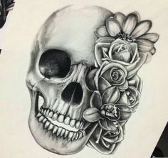 a drawing of a skull with flowers on it