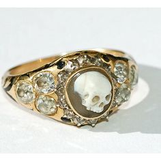 18k gold with a carved agate skull surrounded by rose- and old-cut diamonds and black enameling, with hallmarks for London 1852. But as if that weren’t good enough, there’s an interior inscription on the ring that adds another fascinating layer of history: Inscribed “James Dixon Obit 1852,” it memorializes James Dixon, a well-known English silversmith and founder of the family firm of James Dixon & Sons. Horn Pendant Necklace, Horn Pendant, Moon Pendant Necklace, Cheap Jewelry, Crystal Necklace Pendant, The Ring