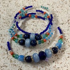 Eleke for Yemaya Mayelewo with Czech glass beads.  Would like a different style? Simply send us a message for more information.  --------------------------- Collar para Yemaya Mayelewo hecho con cuentas de cristal checas.  Quiere un estilo diferente ? Simplemente envíenos un mensaje para mas información. Blue Glass Spiritual Beads, Spiritual Blue Glass Beads, Blue Czech Glass Beads For Festivals, Festival Blue Czech Glass Beads, Blue Glass Beads With Unique Style, Beaded Necklaces, Czech Glass Beads, Czech Glass, More Information