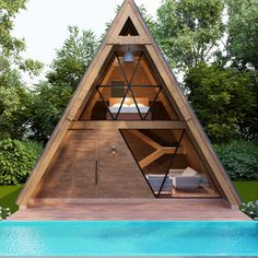 a wooden structure with a pool in the background and trees around it that have been designed to look like a house