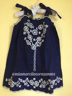 Vintage navy blue dress for baby, white floral embroidery mexican dress, vtg summerdress, yucatan tunic, first fiesta summer dress, encanto Beautiful embroidered vintage mexican dress, ideal for spring and summer, mexican parties, etc. Colour: Navy blue/white embroidery You can adjust the straps on the shoulder with a cute bow Made of cotton Fits Size 12M/1 year Care instructions: Wash by hand with cold water and hang to dry. * Visit the shop * https://www.etsy.com/shop/Miamorcitocorazon * Follo Navy Sundress For Summer, Navy Beach Dress For Summer, Floral Embroidered Sundress, Navy Dress For Spring Beach Occasion, Navy Spring Beach Dress, Charro Days, Vintage Mexican Dress, Embroidery Mexican, First Fiesta