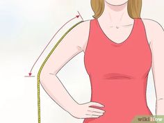 a woman with her hands on her hips wearing a red tank top and measuring tape around her waist