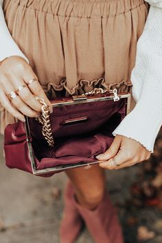 You will be serving up sass when you carry this trendy windsor wine colored clutch featuring faux leather material, a pressure clasp closure, a removable chain link shoulder strap, and a spacious fully lined pouch with an additional inside zip closure pocket! Elegant Rectangular Clutch For Fall, Elegant Fall Rectangular Clutch, Elegant Rectangular Fall Clutch, Chic Burgundy Evening Bag For Party, Chic Burgundy Rectangular Clutch, Chic Burgundy Clutch For Party, Elegant Fall Bags With Chain Strap, Chic Burgundy Clutch For Everyday Use, Chic Burgundy Clutch Evening Bag