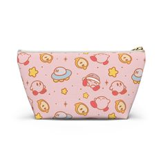 This cute pencil case/make up bag is inspired by our Kirby mugs with the same design. This time we designed to make the background pink to make it cute and aesthetic.  This pouch is perfect for storing all of your school and beauty needs, the ultimate accessory for all Kirby fans. This versatile bag is perfect for storing your make up, school supplies, gaming accessories or use it for traveling.  Designed by me Made with high quality mercurial, durable and easy to clean Lightweight and easy to carry in your purse or backpack Secure zipper to keep your items safe and organized  They make excellent pencil cases and cosmetic travel bags. They are constructed from a durable material with a zipper closure. .: 100% Polyester .: With non-woven laminate inside .: Assembled in the USA from globally Make Up School, Gaming Aesthetic, Cute And Aesthetic, Cute Pencil Case, Cute Pencil, Background Pink, School Supply, Meme Design, Aesthetic Cute