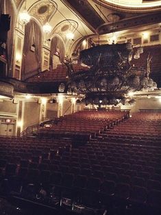 an empty auditorium filled with lots of seats