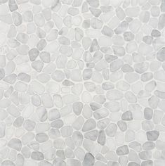 a white and grey stone wallpaper with lots of small rocks on it's surface