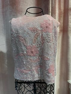 ❤️❤️ DESCRIPTION ❤️❤️ Vintage 1960s sequin floral baby light pink zip up top ❤️❤️ MEASUREMENTS ❤️❤️ Waist 17  Chest 18 Pink Embellished Party Top, Pink Sequined Sleeveless Tops, Pink Sleeveless Sequined Tops, Pink Fitted Sequin Fabric With Floral Embroidery, Fitted Pink Sequin Fabric With Floral Embroidery, Pink Embellished Evening Tops, Fitted Embellished Pink Tops, Vintage Sequin Top For Spring, Fitted Pink Sequin Top