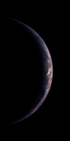 the earth as seen from space in this image, it is dark and has no clouds