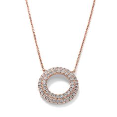 This 14-karat rose gold circle pendant makes a dazzling everyday accessory with two rows of natural diamond pavé. A lobster clasp keeps this beautiful necklace secure. Rose Gold Pave Setting Round Necklace, Rose Gold Round Necklace With Pave Setting, Dazzling Rose Gold Round Necklaces, Dazzling Rose Gold Round Necklace, Rose Gold Necklace With Pave Setting Round Pendant, Rose Gold Pave Setting Round Pendant Jewelry, Rose Gold Jewelry With Pave Setting In Round Pendant, Rose Gold Jewelry With Pave Setting Round Pendant, Rose Gold Circle