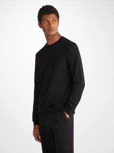 Our Quinn sweatshirt is stylish, yet practical. Designed for a relaxed fit with ribbed cuffs and neck trim and featuring a concealed zipped side pocket, this sweatshirt will hold its shape - no matter how many days wear it has! The Quinn fabric combines all the key qualities of our cotton and micro modal; it's durable and has great colour retention, meaning it can withstand long-lasting wear and the black colour won't fade. It's thermoregulating, making it perfect for warm days or cosy evenings Long Sleeve French Terry Top With Ribbed Waistband, Athleisure Sweatshirt With Ribbed Cuffs For Layering, Relaxed Fit Sweatshirt With Double-needle Sleeve For Loungewear, Athleisure French Terry Long Sleeve Sweatshirt, Athleisure Long Sleeve French Terry Sweatshirt, Relaxed Fit Sweats With Ribbed Cuffs For Layering, French Terry Crew Sweater With Ribbed Collar, Crew Neck Sweater With Ribbed Collar In French Terry, Everyday Athleisure Sweatshirt With Ribbed Cuffs