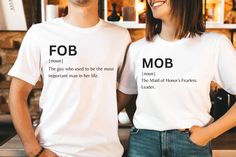 two people standing next to each other wearing t - shirts that say bob and fob