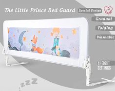 the little prince bed guard is white and has an image of a fox on it