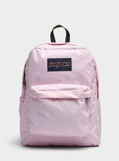 - JanSport at Simons- Casual classic in a spacious design featuring large pockets and rugged hardware- Rugged polyester fabric- Two-way zip closure- Zip pocket at the front- Grab handle and adjustable padded straps- Inner padded compartment for a laptopHeight: 17.75" (45 cm)Width: 15.75" (40 cm)Width: 6" (15 cm)Volume : 26 L Pink Ice Jansport Backpack, Jansport Bag, Pink Jansport Backpack, Light Pink Backpack, School Wishlist, Cute School Bags, Stylish School Bags, School Bookbags