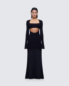 Draped in midnight magic, this black maxi dress is the perfect blend of sultry and mysterious 🖤 Made from a blend of stretch double knit and mesh fabric, and complete with a cutout bodice, this fit and flare style will have you channeling your inner seductress 😏 Black Maxi Dress With Cut-out Waist For Evening, Dramatic Black Fitted Dress, Black Fitted Dramatic Dress, Black Cutout Dress In Elastane, Evening Bodycon Dress With Cutout, Black Elastane Evening Dress, Cutout Bodycon Dress For Evening, Evening Bodycon Dress With Cutout Details, Floor-length Cutout Maxi Dress For Gala