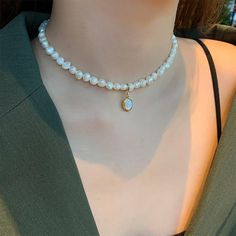 Freshwater pearls are found in rivers and lakes, hidden within mussel shells. They are extremely beautiful and make a statement whenever they are worn. Moonstone is a beautiful gemstone that is believed to calm the troubled soul and inspire intuition in the heart.Together, freshwater pearls and moonstone are timeless, elegant, and luxurious.

Gold-plated 
Imitation freshwater pearls, moonstone
Size: 45cm (+adjustable)
Lobster clasp closure 
Hypoallergenic, lead & nickel free 

If you aren't in L Elegant Pearl Necklaces, Opal And Pearl Necklace, Luxury Pearl Necklace, Pearl Necklace With Pendant, Neck Chain, Moonstone Necklace, Pretty Jewelry, Affordable Jewelry, Freshwater Pearl Necklaces