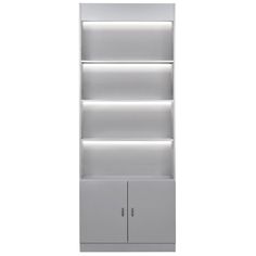 a white book shelf with two doors and lights on the top, in front of a white background