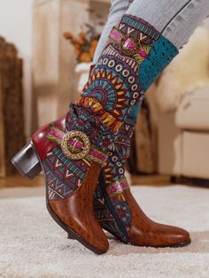 Enliven your ensembles with the bohemian charm of this knee-high boot that features a soft leather upper and vibrant patterned details. This unique style pairs effortlessly with jeans or our signature shacket or knit sweaters. 1'' heel 13.8'' shaft 14.8'' circumference Side zip & buckle closure Leather upper Leather lining Leather insole Rubber sole Leather Knee Boots, Reindeer Headband, Knit Sweaters, Knee Boot, The Bohemian, Daily Dress, Dress Jewelry, Knee High Boots, Brown Color